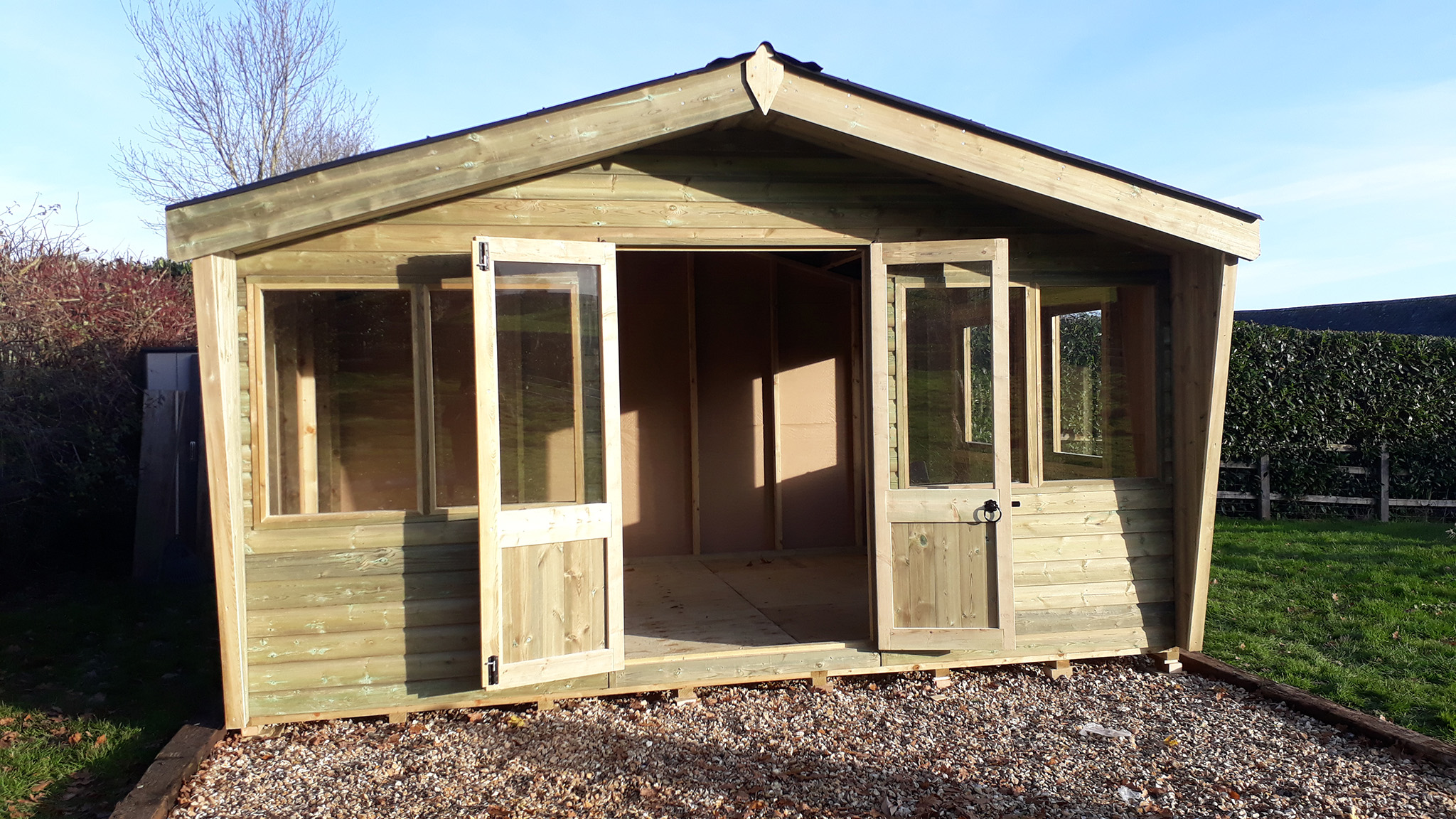 Deluxe Chalet Style Summerhouses - Buy Direct from Harris Timber Products